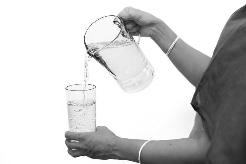 Leaving No One Behind: Human Right to Water in India - Clean water being taken for drinking in South-East district, National Capital Territory of Delhi